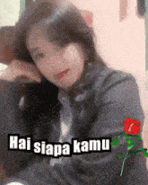 a picture of a woman with the words hai siapa kamu on the bottom