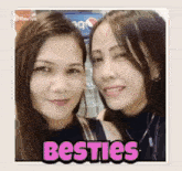 two women are posing for a picture together with the words `` besties '' in the corner .