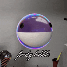 a purple and white soap bubble with the words freaky bubble above it