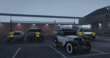 several cars are parked in front of a building with the number 3