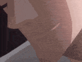 a close up of a man 's face with a slight smile