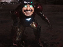 a man in an iron man suit is wearing a beanie that says l' azzard