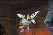 a cartoon drawing of a robot with the number 111 on it 's wings