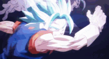 a cartoon character with blue hair and a blue shirt is fighting another character .