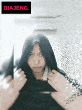 a picture of a woman with a black scarf around her head and the word diajeng on the bottom