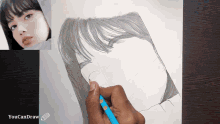 a person is drawing a woman 's face with a blue pencil and the words youcandraw below it