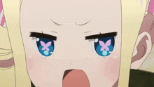 a close up of a girl 's face with a hand covering her face