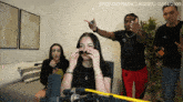 a group of people are standing around a woman wearing sunglasses and the caption says take off sunglasses - 2,504 / 2500