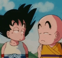 two cartoon characters , goku and krilin , are standing next to each other .
