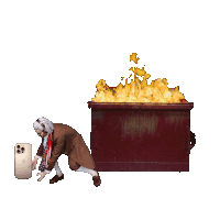 a man is kneeling down next to a dumpster that is on fire