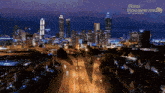 an aerial view of a city at night with real housewives out of context