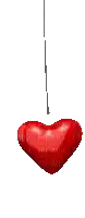 a red heart hanging from a string on a white background .