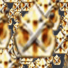 a blurred image of a fence with a pattern of branches