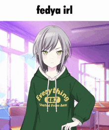 a girl wearing a green hoodie that says " everything 48 "