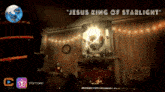 jesus king of starlight is written above a fireplace in a dark room