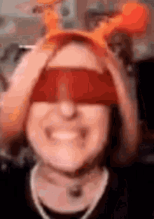a blurry picture of a person wearing a red headband
