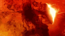 a man is holding a sword and shield in front of a fireball .