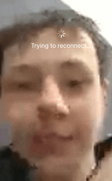 a close up of a person 's face with the words " trying to reconnect " on top