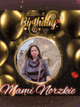 a picture of a woman surrounded by gold balloons says happy birthday