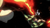 a cartoon character is laying on the ground with a fireball coming out of his mouth .