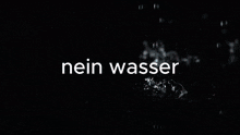 a man blowing his nose with the words nein wasser written above him