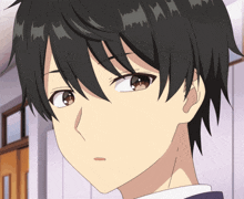 a close up of a anime character 's face with a slight smirk on his face
