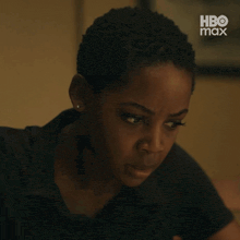 a close up of a woman 's face with the words hbo max in the background
