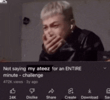 a video of a man covering his mouth is titled not saying my ateez for an entire minute - challenge