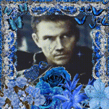 a man is surrounded by blue flowers and butterflies in a blue frame