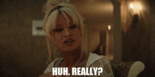 Pam And Tommy Pamela Anderson GIF - Pam And Tommy Pamela Anderson Huh Really GIFs
