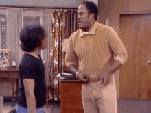 James Evans Good Times GIF - James Evans Good Times Butt Whipping GIFs