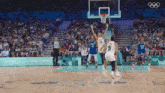 a basketball game is being played at the olympics