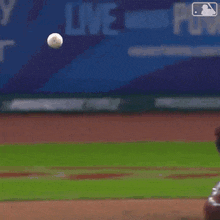 a baseball player with the number 9 on his jersey swings at a pitch