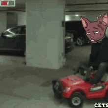 a cartoon of a cat with a cross on its forehead sitting on a toy car