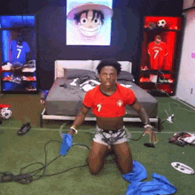 a man wearing a crop top with the number 1 on it