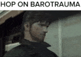a picture of a man with the words hop on barotrauma above him