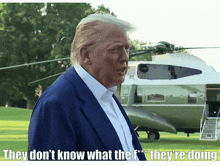 donald trump standing in front of a helicopter with the caption they don t know