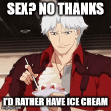 a man in a red shirt is eating an ice cream cone with strawberries on it