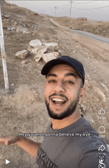 a man taking a selfie with a caption that says " hey you not gonna believe my eye "