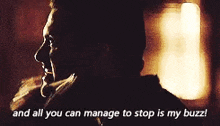 a man is talking on a phone with the words and all you can manage to stop is my buzz .