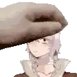 a hand is putting a hat on a woman 's head .
