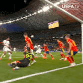 a soccer game is being shown on uefa tv