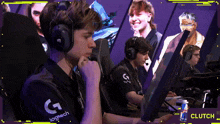a man wearing headphones and a logitech shirt