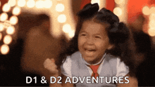 a little girl is laughing with the words " d1 & d2 adventures " behind her