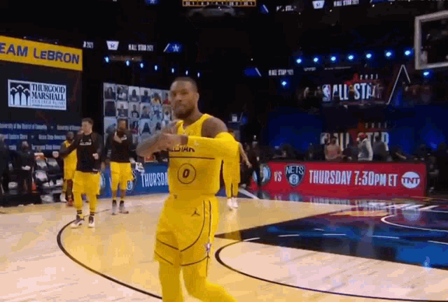 A gif from Damian Lillard in All Star game making his signature move "It's Dame Time"