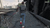 a man is running down a street in a video game with a score of 294 on the screen