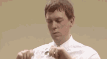 He Can Bend Spoons GIF - A Bit Of Fry And Laurie Hugh Laurie Spoons GIFs
