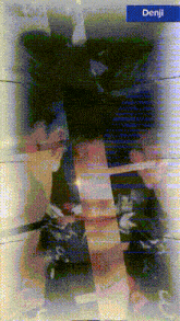 a blurry picture of a person with the word denji on the bottom