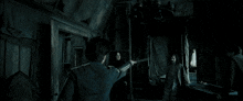 a dark room with a staircase and a window with smoke coming out of it