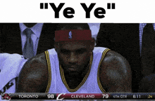 a basketball player wearing a headband with the word ' ye ye ' on it